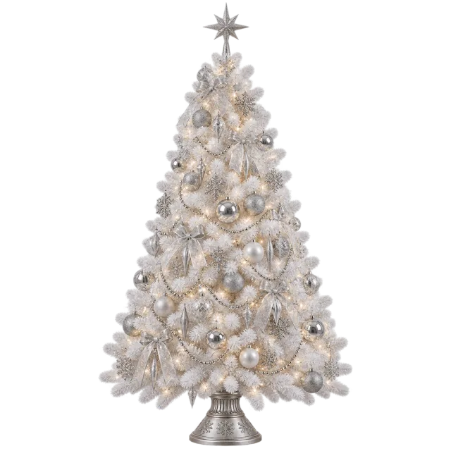 White tree with silver ornaments, pale ribbons and a silver star