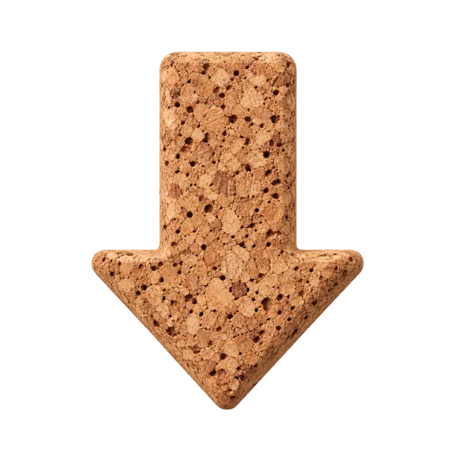 Thick downward arrow with a speckled tan cork texture