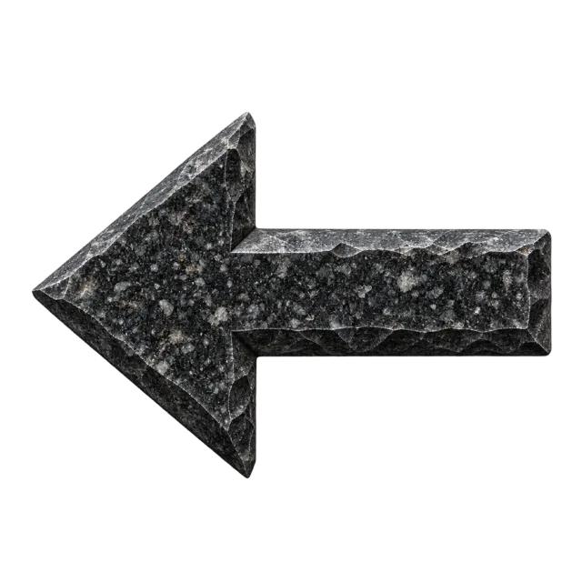 Thick left-pointing arrow with a speckled black and gray stone-style surface