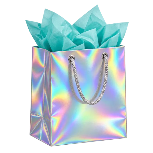 An iridescent gift bag with silver-colored handles and pointed turquoise tissue paper