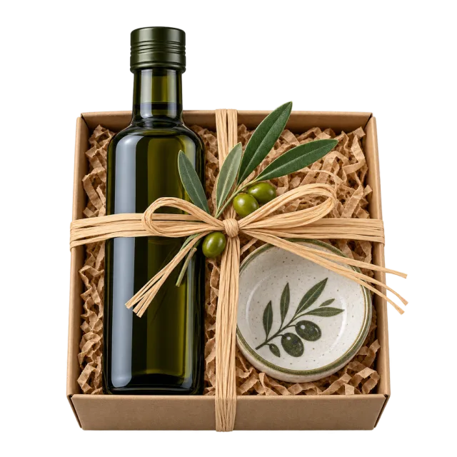 A wooden presentation box holding a dark bottle and a small olive-patterned dish, tied with twine and an olive sprig