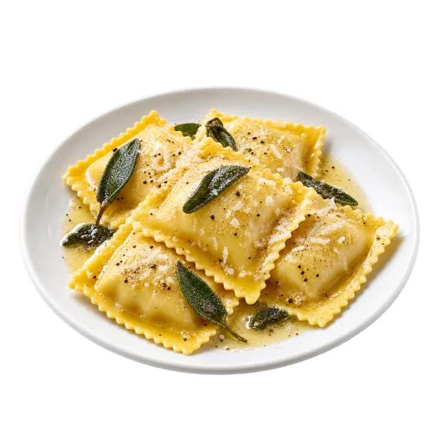 Square filled pasta parcels on a white plate with green sage leaves, grated cheese and seasoning
