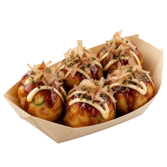 Golden takoyaki balls in a paper tray topped with dark sauce, pale sauce and thin flakes