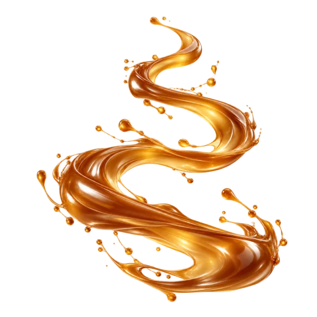A glossy amber caramel ribbon curves between suspended droplets