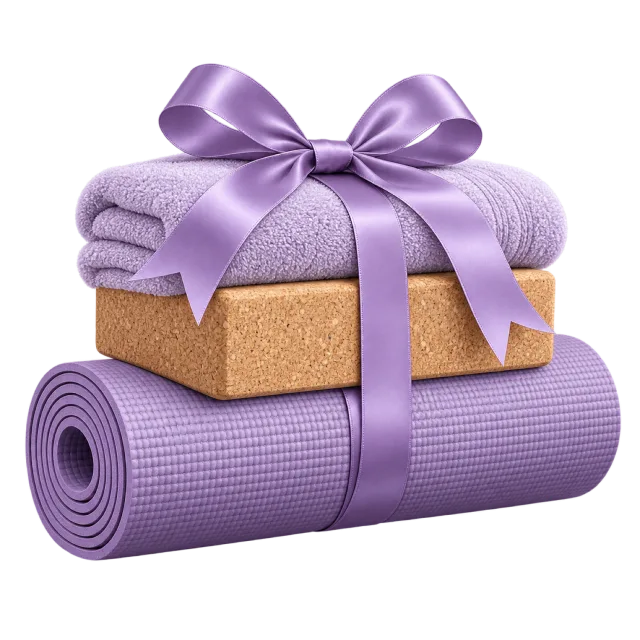 A rolled purple yoga mat, towel and cork-colored block are tied with a purple bow