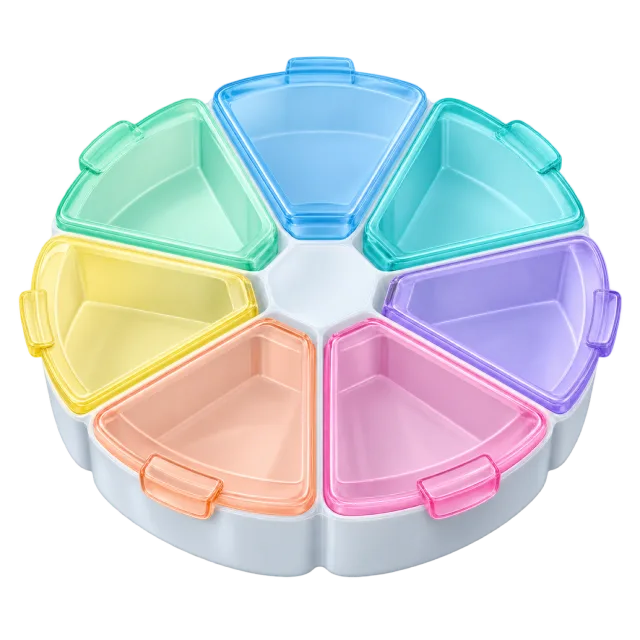 A round pill organizer has pastel wedge-shaped compartments