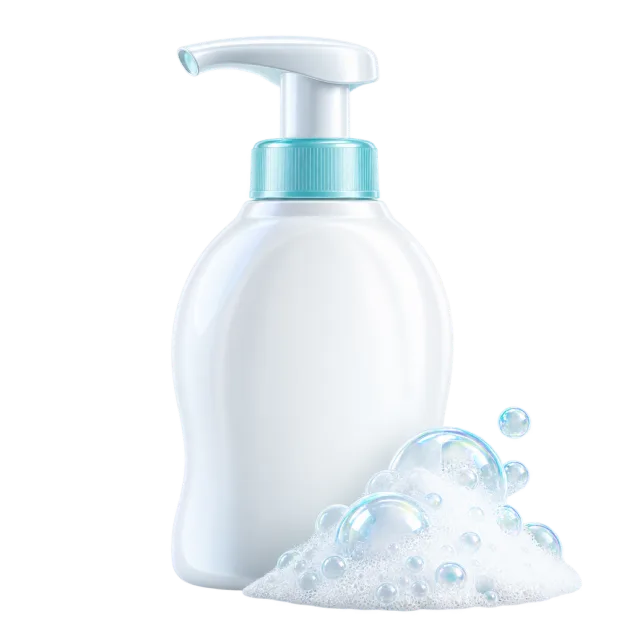 A white pump soap bottle stands beside a mound of foam