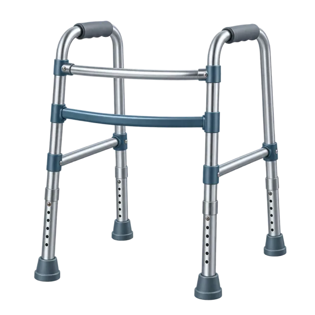 A silver walking frame has gray handgrips and rubber feet