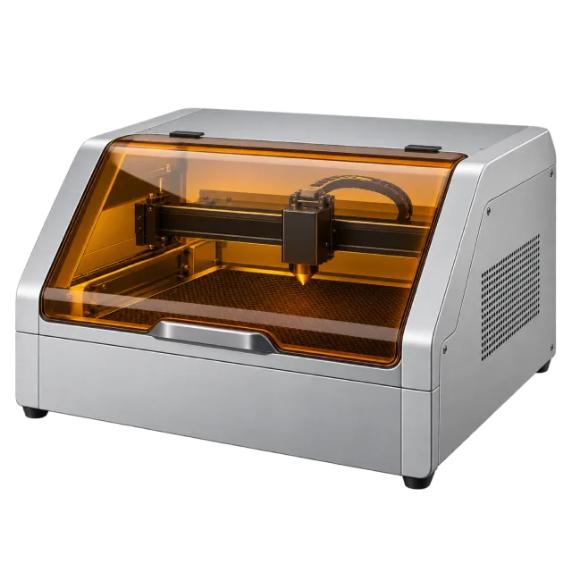 A desktop cutting machine has an orange-tinted lid