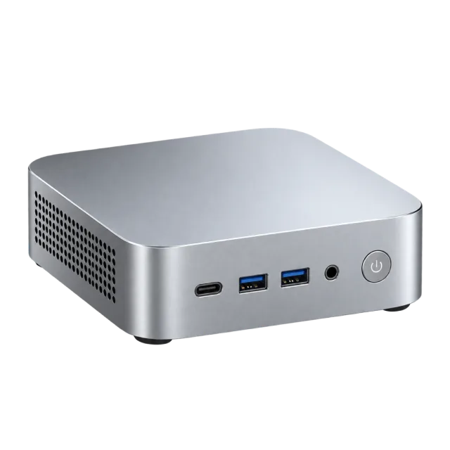 A compact silver desktop computer has front ports
