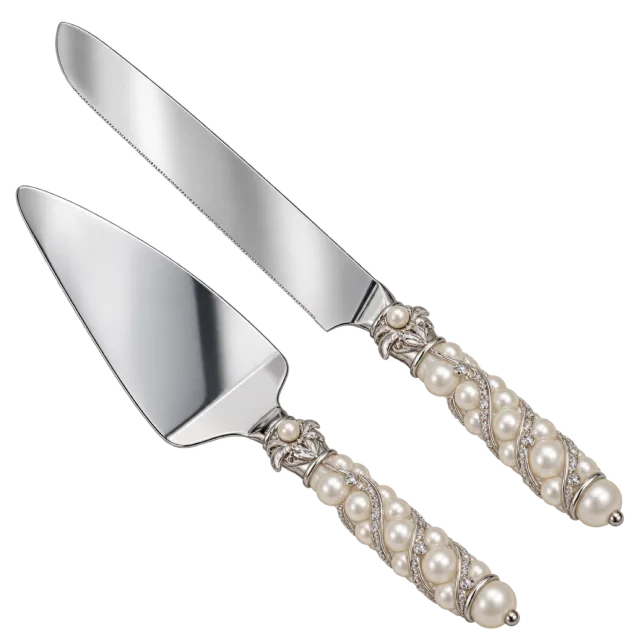 A silver-colored cake knife and server have decorated pale handles