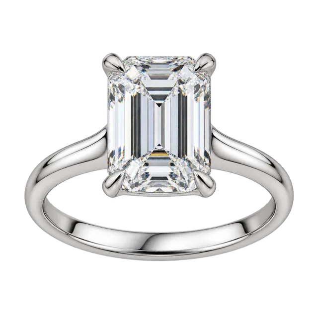 A silver-colored ring holds a clear rectangular-cut stone