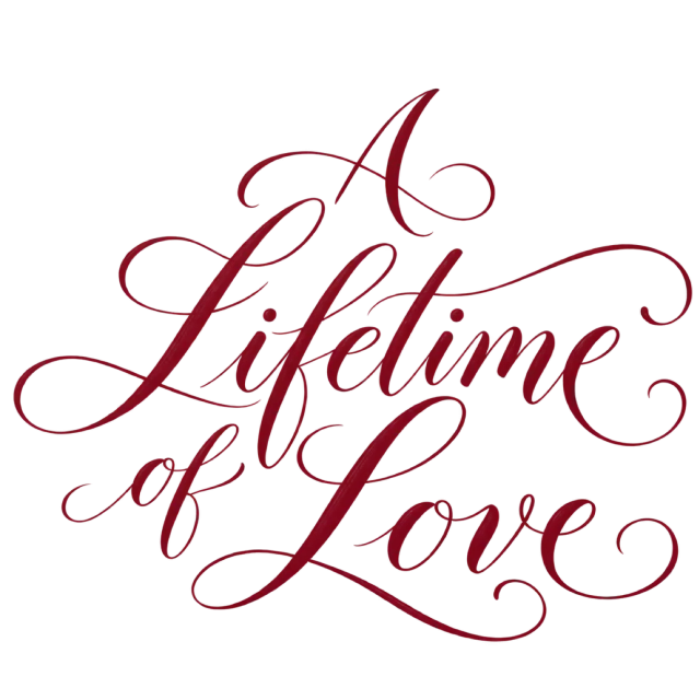 The words “A Lifetime Of Love” in fine burgundy script with looping ornamental strokes