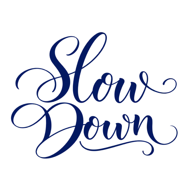 The words “Slow Down” in navy blue lettering with long, sweeping flourishes