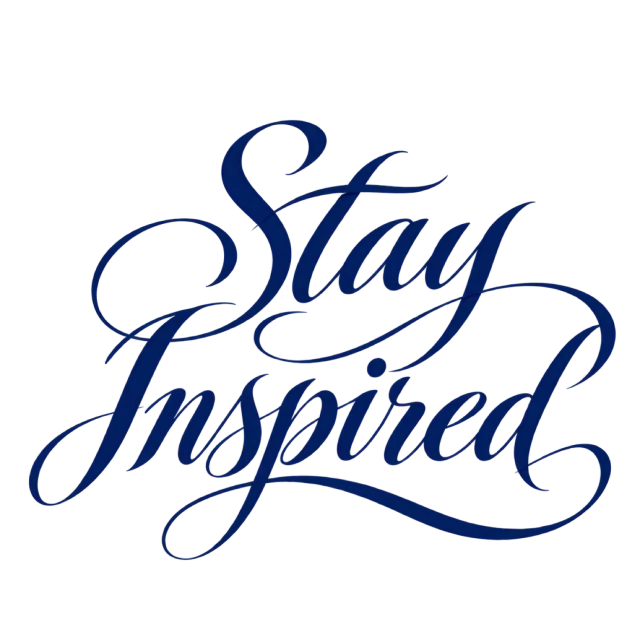 The words “Stay Inspired” in navy blue lettering with long, sweeping flourishes