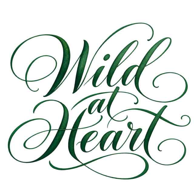 The words “Wild At Heart” in deep green script with long, flowing flourishes