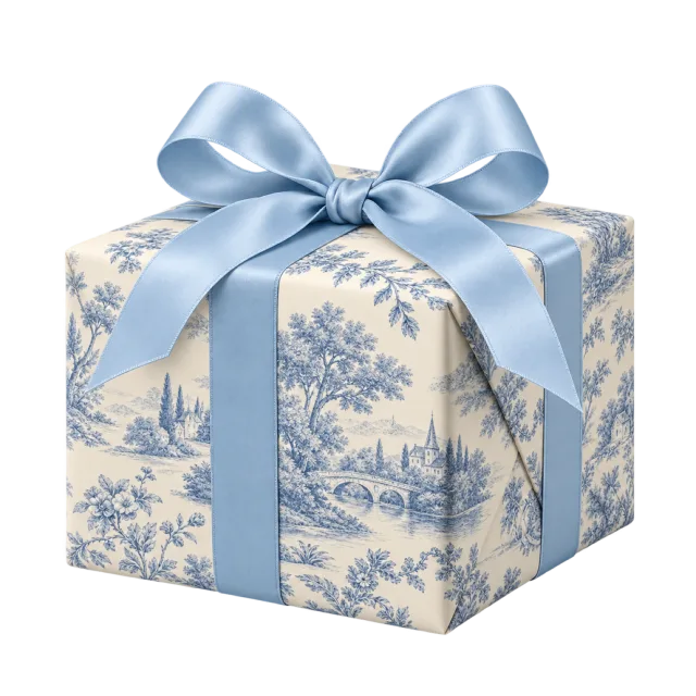 A cream parcel with blue scenic toile-style patterns and a pale blue bow