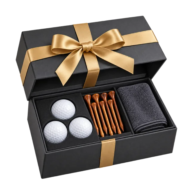 A black presentation box with white golf balls, wooden tees and a dark accessory pouch under a gold ribbon