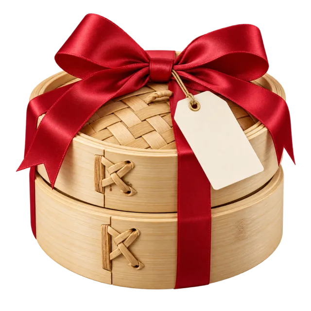 Stacked bamboo-style steamer boxes tied with red ribbon and a blank tag