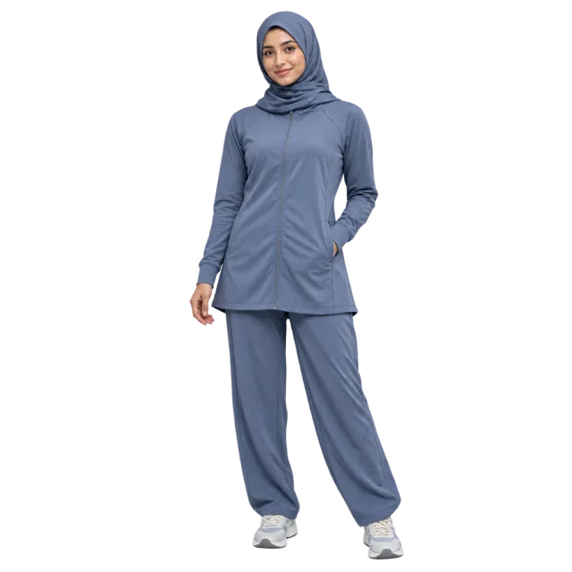 Woman wearing a blue headscarf and matching long-sleeved tracksuit