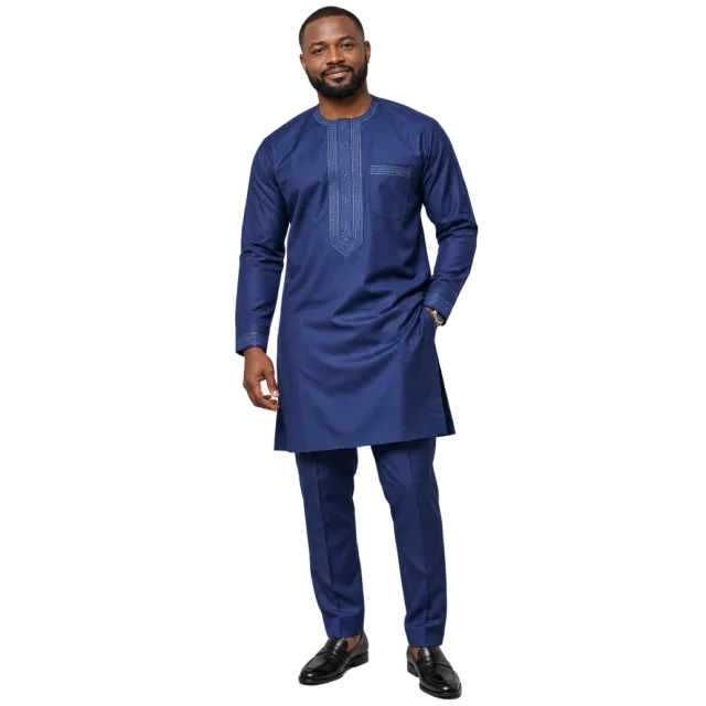 Man wearing an indigo long tunic and matching trousers
