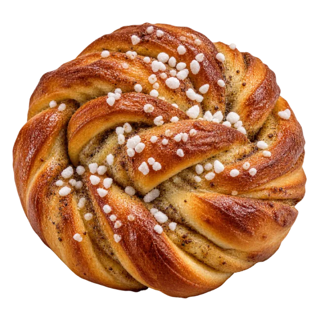 Braided cardamom bun topped with small white sugar pieces