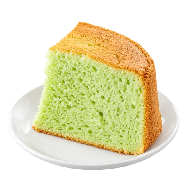 Tall pandan chiffon cake slice with a light green crumb and golden top
