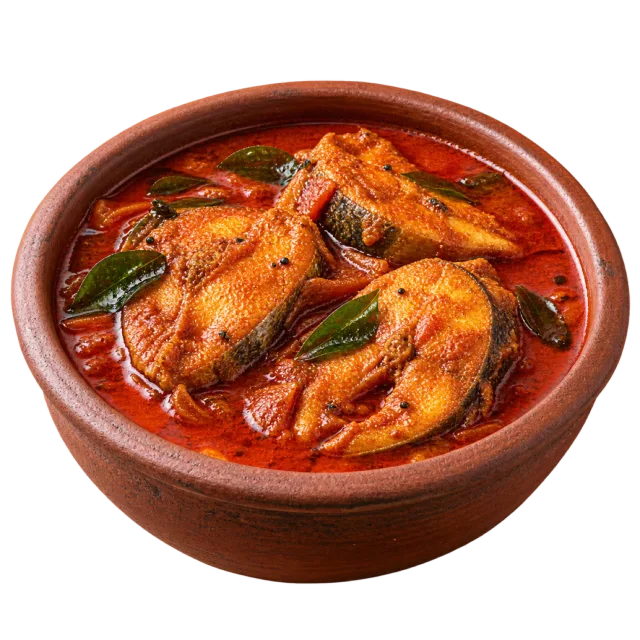 Kerala fish curry with fish steaks in red sauce and green leaves in a clay-colored bowl