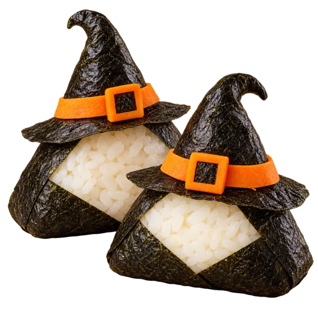 Triangular rice onigiri decorated with black witch hats and orange buckles