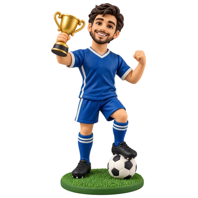 Football player figurine in a blue kit holding a gold trophy beside a ball