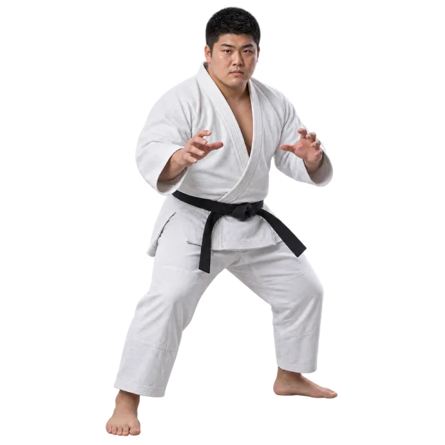 Judo practitioner in a white gi and black belt with hands held forward