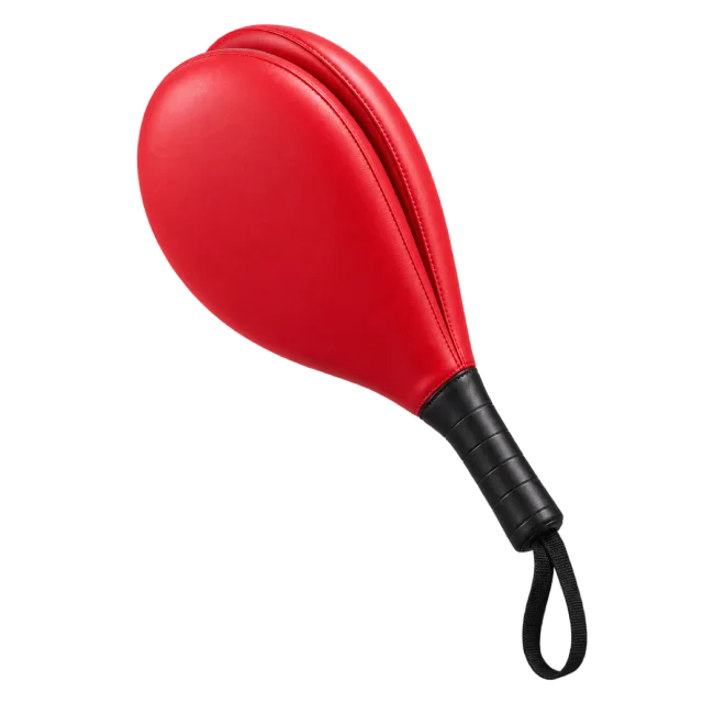 Red double kick paddle with a black handle and wrist loop