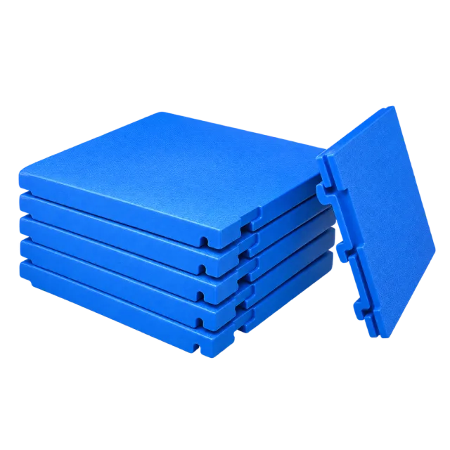 Stack of blue rebreakable training boards with one board standing upright