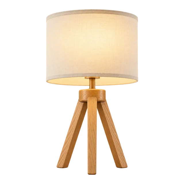 Table lamp with three wooden legs and a glowing cream drum shade