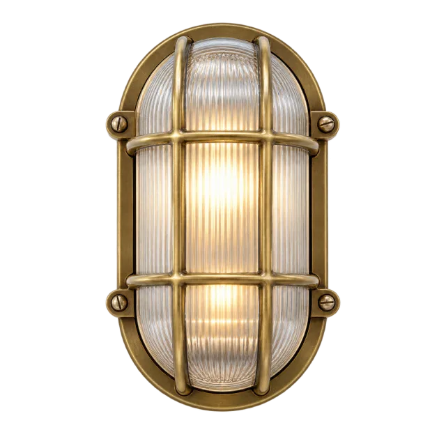 Oval nautical-style wall light with a brass-colored cage and ribbed glass
