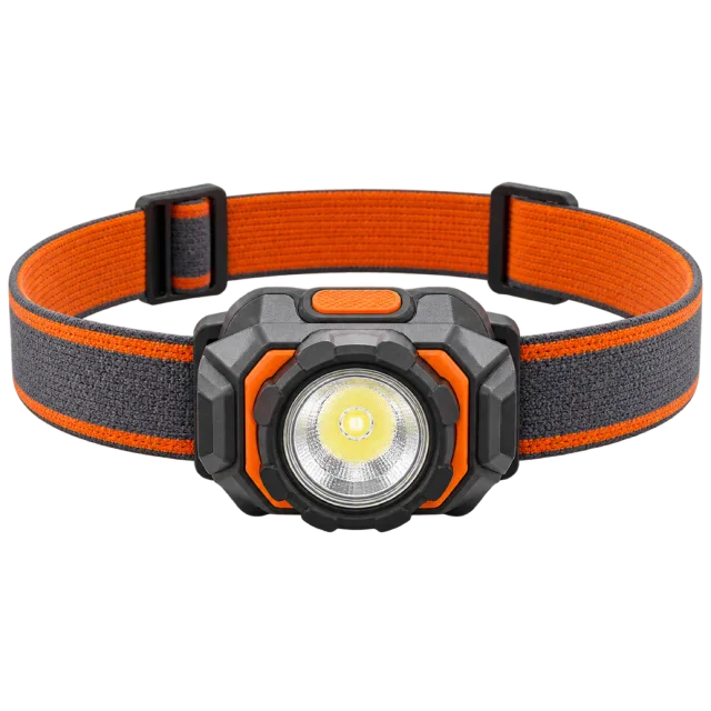 Grey headlamp with an orange strap and a round illuminated lens