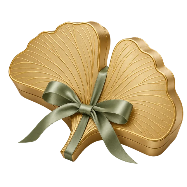 Golden fan-shaped ginkgo leaf gift box tied with a sage green ribbon