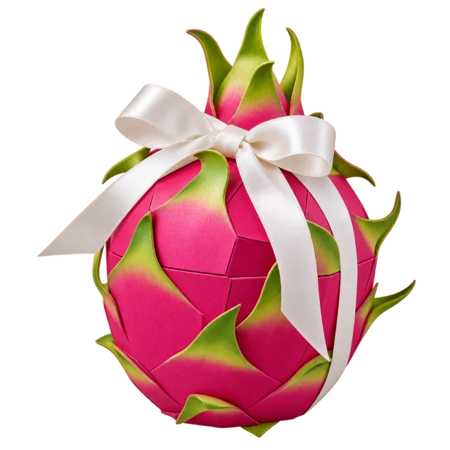 Pink dragonfruit-shaped gift box with green tips and a white bow