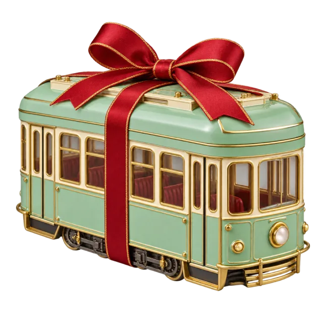 Mint green vintage tram gift box tied with a red ribbon