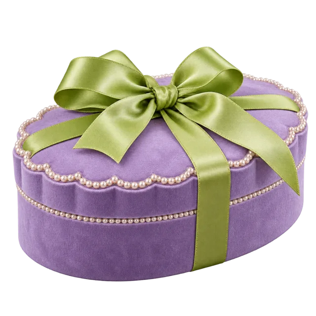 Purple oval gift box with scalloped trim and a green ribbon