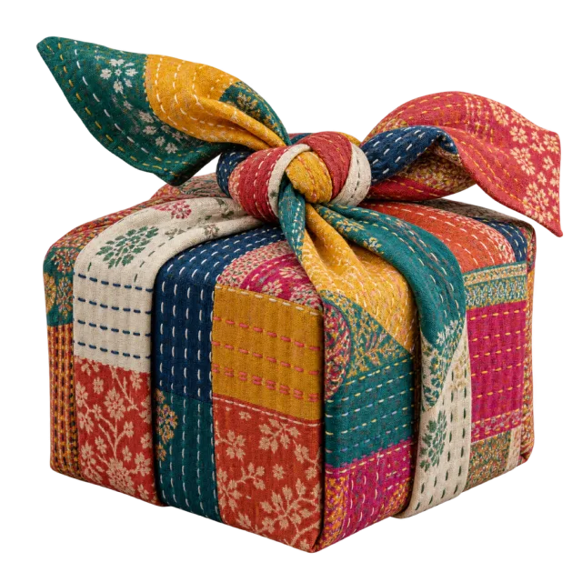 Colorful patchwork fabric gift bundle tied with a matching knot