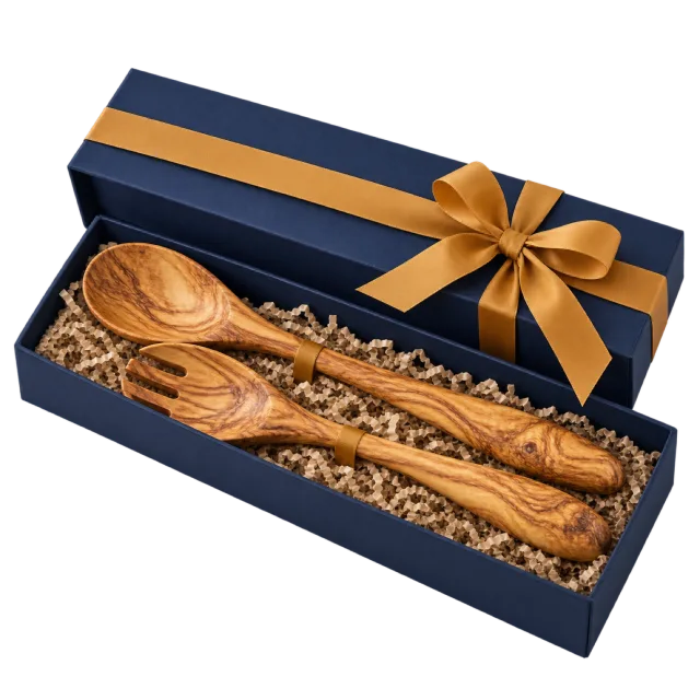 Navy gift box with wooden salad serving utensils and a golden ribbon