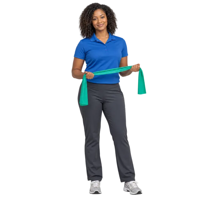 Woman in a blue polo shirt stretching a green resistance band