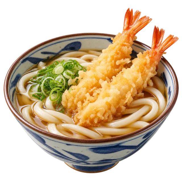 Patterned bowl of thick noodles in broth topped with two shrimp tempura and green onions