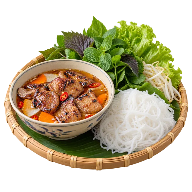 Grilled pork in a dipping bowl with white noodles and fresh herbs on a bamboo tray