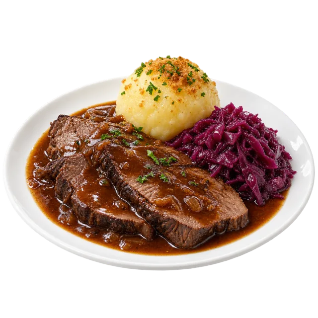 Sliced roast meat in dark gravy with a round dumpling and shredded red cabbage