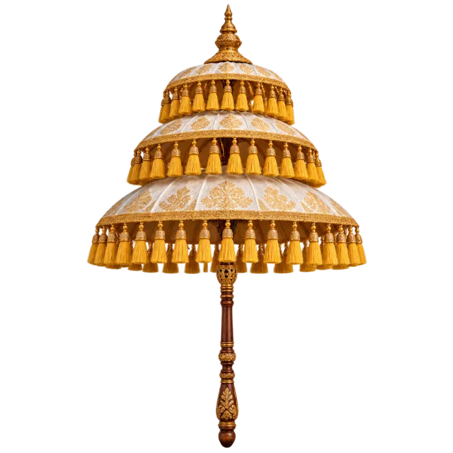 Gold-colored tiered ceremonial umbrella with hanging ornaments and a carved handle