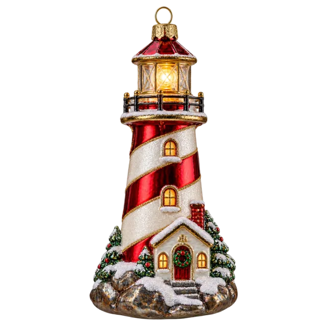 Red and white striped lighthouse ornament with snowy rooftops