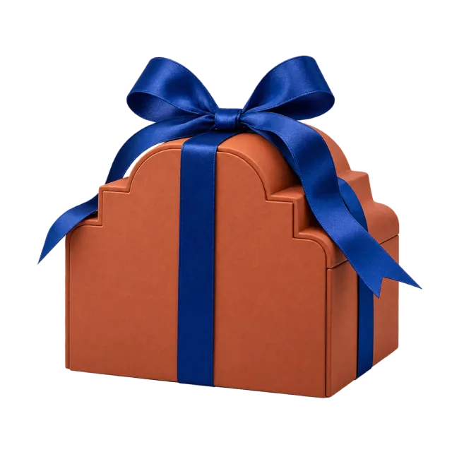 Terracotta arch-shaped box tied with a cobalt blue ribbon
