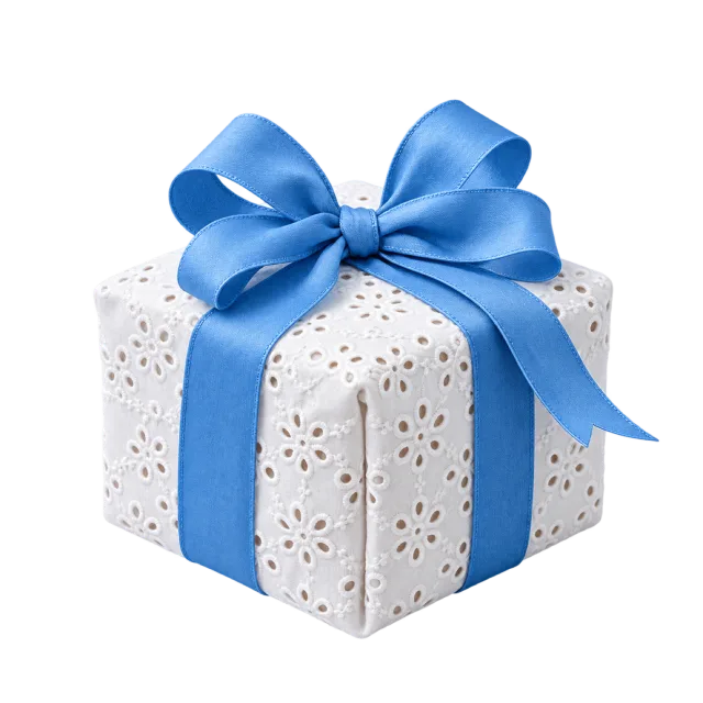 White eyelet-patterned box with a bright blue bow